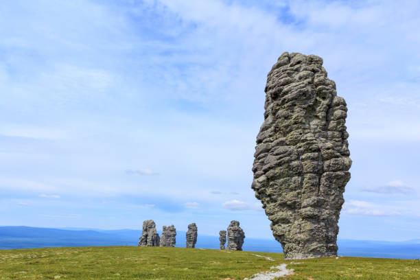 Deemed one of the Seven Wonders of Russia, the Manpupuner rock formations are a popular attraction in Russia. stock photo