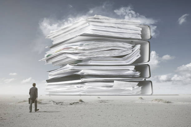 a mountain of paperwork - red tape imagens e fotografias de stock