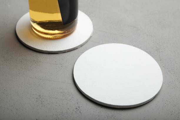 istock White round beer coaster. Round template mockup 1073742178