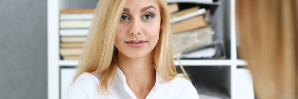 istock Partnership agreement closeup with woman in suit shake 1073743514