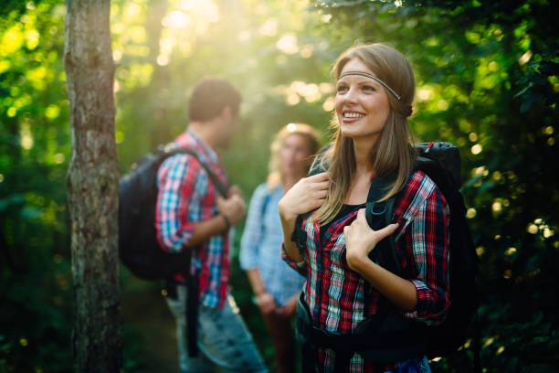 istock People trekking in forest and having fun 1073746702