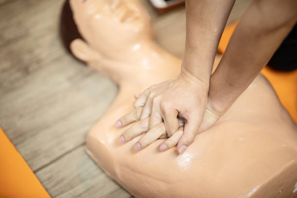 istock First Aids Emergency CPR training for rescue Heart Attack push hands on chest for sample and testing for right way to rescue,Selective Focus 1073748218
