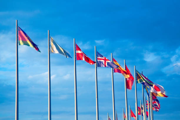 istock Many flags of different countries against the sky. 1073751768