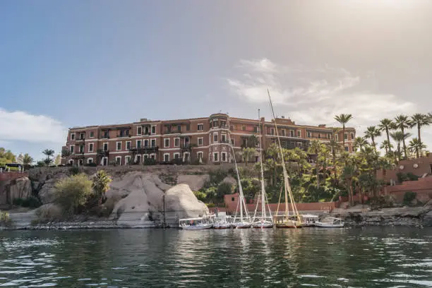 Aswan/Egypt - 01/23/2018: The Sofitel Legend Old Cataract Hotel, also known as the Old Cataract Hotel, is a historic British colonial-era 5-star luxury resort hotel located on the banks of the River Nile in Aswan, Egypt.