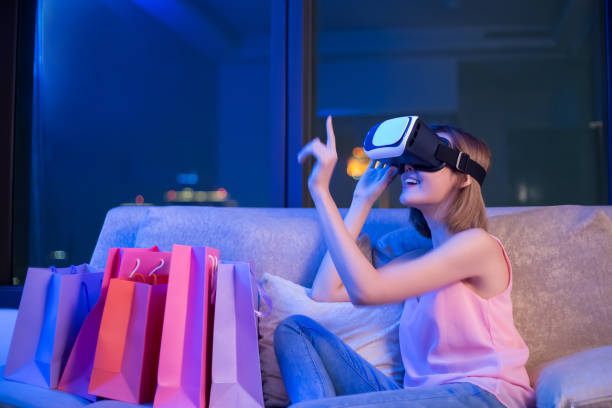 istock woman shopping with VR headset 1073755126