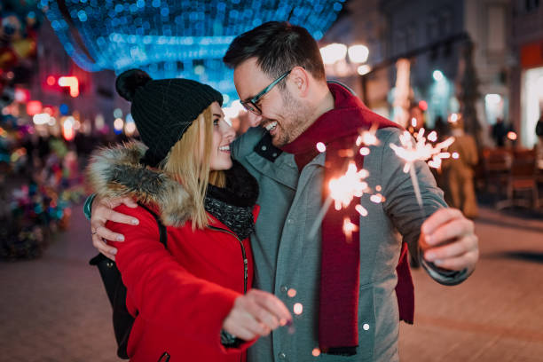 istock Affectionate couple enjoy spending time together on Christmas holiday. 1073758914