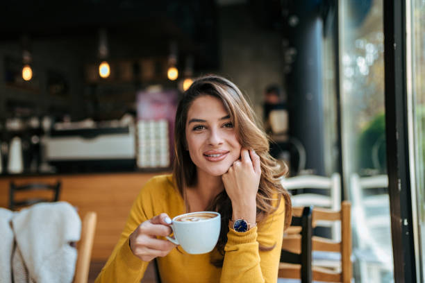 istock Portrait of a young lady drinking coffee. 1073759256