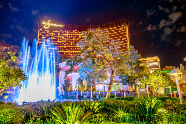 Wynn Fountain dancing show Las Vegas, Nevada, United States - August 18, 2018: Wynn Las Vegas colorful Fountain Show by blue hour, a new fountain show from June 2016. The Wynn is Resort Hotel Casino, a 5-star in Las Vegas Strip wynn las vegas stock pictures, royalty-free photos & images