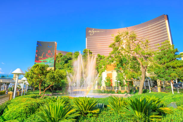 Wynn Fountain show Las Vegas, Nevada, United States - August 18, 2018: Wynn Las Vegas Fountain Show with rainbow in blue sky. The Wynn is Resort Hotel Casino, a 5-star in Las Vegas Strip. wynn las vegas stock pictures, royalty-free photos & images