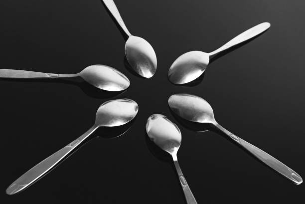 spoons isolated on black