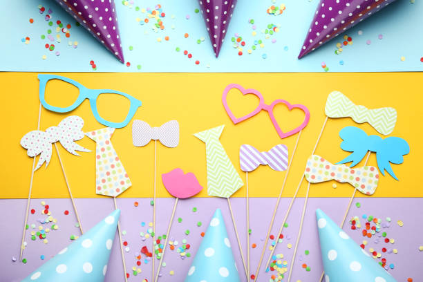 istock Booth props for party with paper caps on colorful background 1073770064