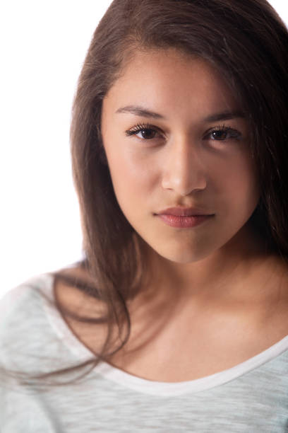istock Young female coldly stares at the camera 1073773164