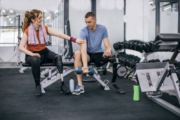 istock Disability couple in gym 1073773286