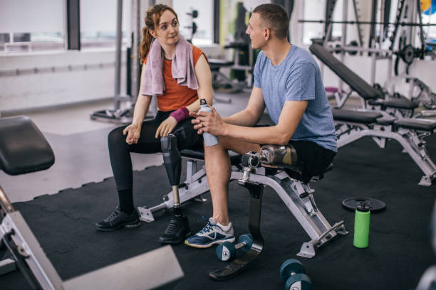 istock Disability people relaxing in gym 1073773756