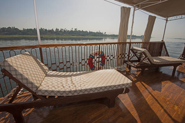 istock Sunbeds on the deck of a luxury river cruise boat with panoramic view 1073778910