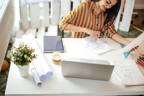 istock Female designer in office working 1073786064