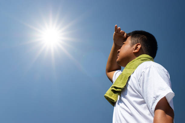 istock Young man and heat stroke. 1073787222