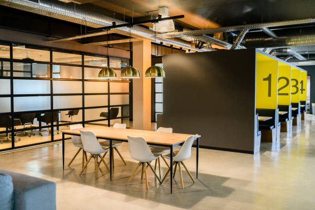 istock Contemporary office interior with table and chairs 1073787842