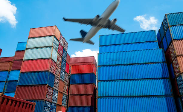 istock Air freight and stack of cargo containers at the docks 1073788224