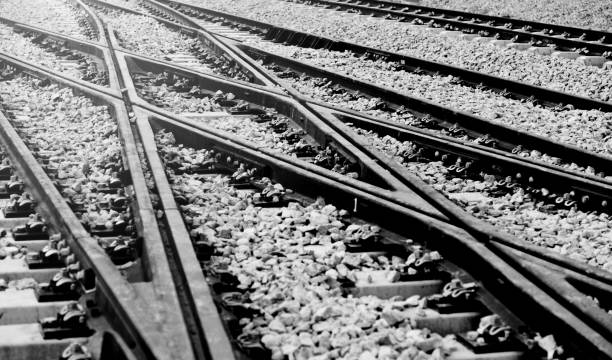 istock Closeup of train line crossing 1073790324