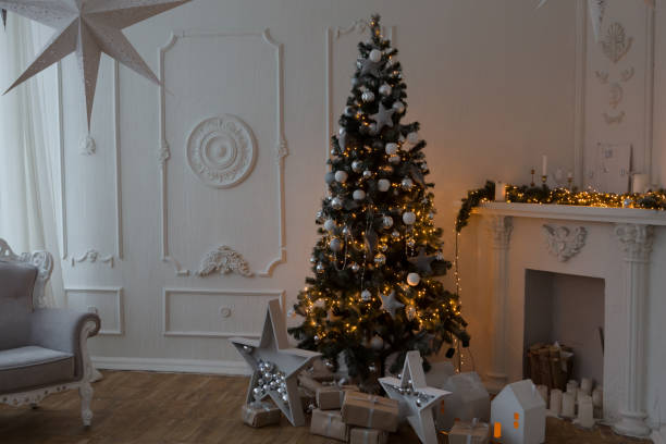 istock Interior living room with a Christmas tree and decorations. 1073802014