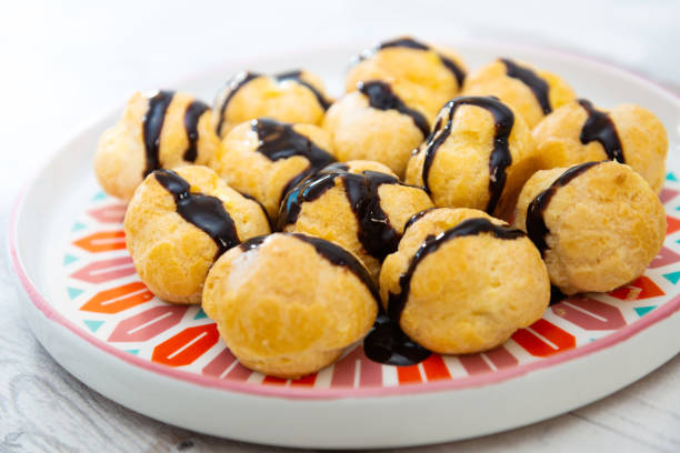 istock Profiterole with vanilla and chocolate sauce 1073806900