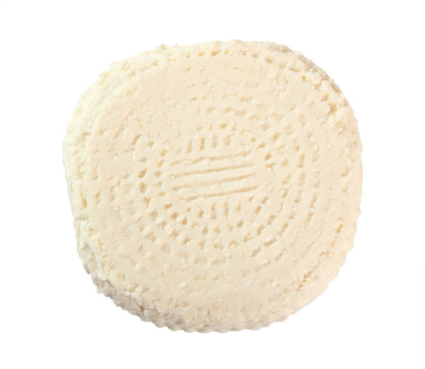 istock Capreggio Goat Cheese. Isolated on white background. Directly Above. 1073815042