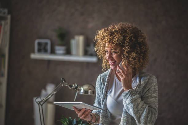 istock businesswoman using tablet    in office 1073818556