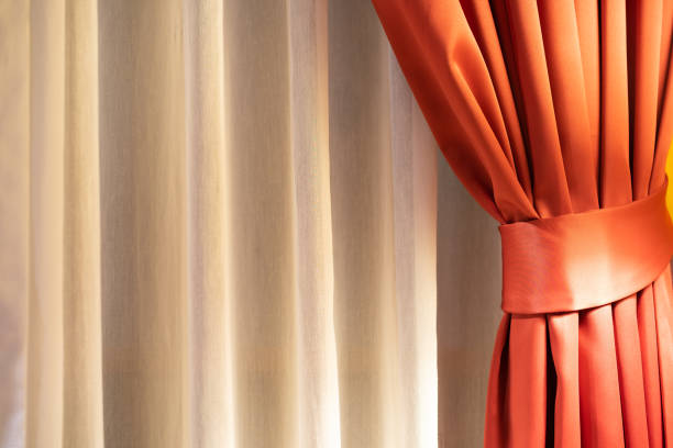 istock Close up red curtain and white curtain 1073821336