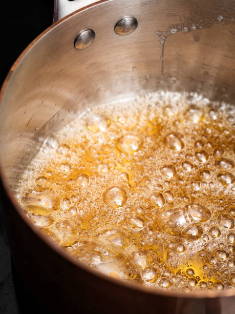 caramel sauce bubbles,food,sugar syrup - maple imagens e fotografias de stock