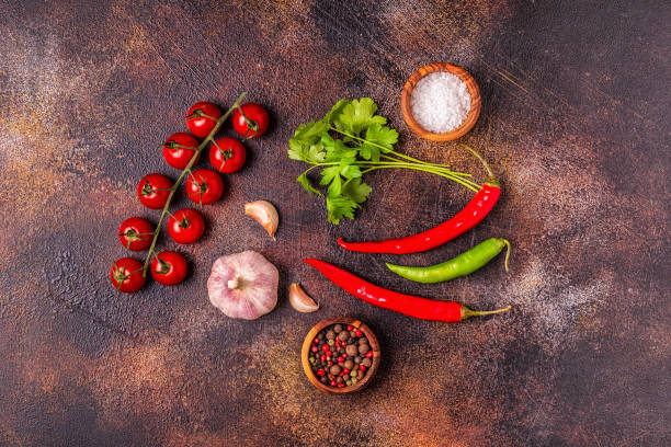 istock Food background with vegetables, spices,  herbs 1073841280