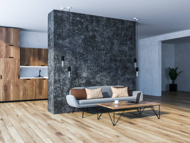 istock Minimalistic concrete living room and kitchen 1073841748