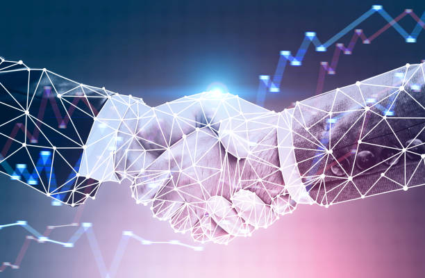 istock Handshake of businesmen, graphs 1073842302