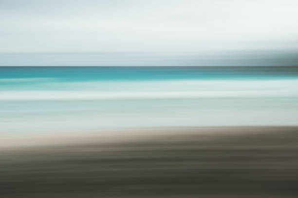 istock Empty sea and beach background with copy space, Long exposure, blur motion blue abstract vintage tinted gradient background 1073852294