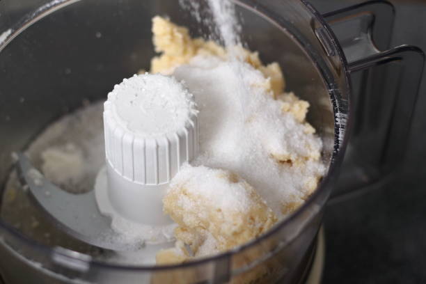 istock Add caster sugar to dough and mix to form soft dough. Making Boston Banoffee Pie. 1073867584