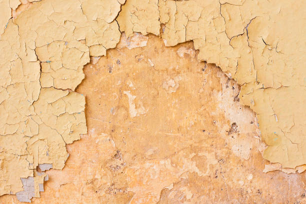istock Empty Old  Wall Texture. Painted Distressed Wall Surface. Grungy Wide  wall. Grunge Red Stonewall Background. Shabby Building Facade With Damaged Plaster. Abstract Web Banner. Copy Space 1073899448