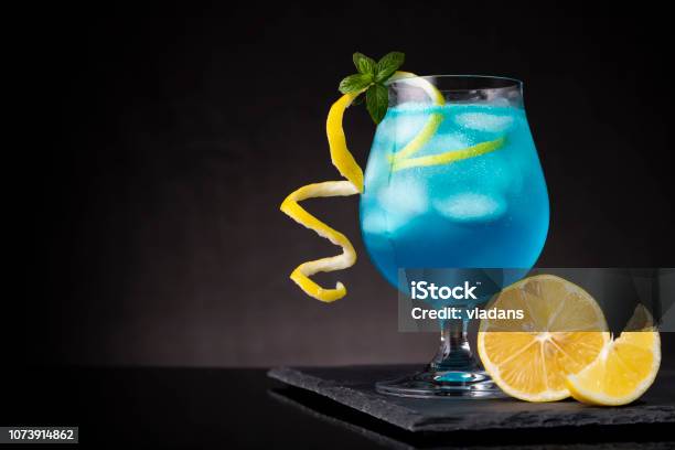 Icy Blue Lagoon Cocktail Stock Photo - Download Image Now - Cocktail, Blue, Alcohol - Drink
