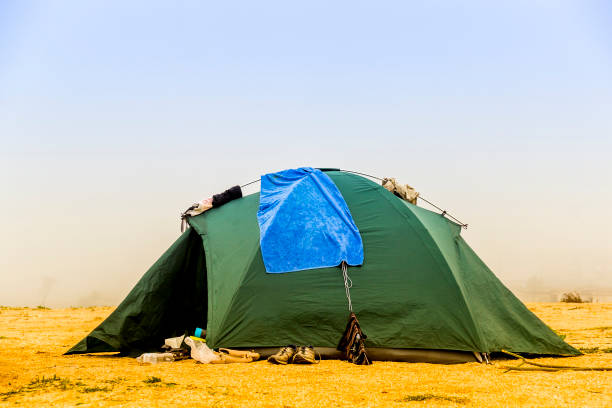 istock green tent at the beach 1073916798