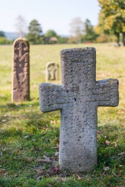 istock Old cemetery tombstones. 1073921278
