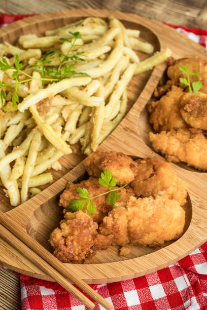 istock Chicken nuggets with yellow beans. 1073925428