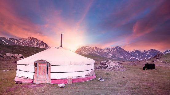 Mongolian Yurt in the Mountains during Sunrise