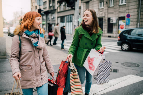 istock Girls returning from shopping 1073935024