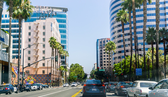 August 17, 2018 San Jose / CA / USA - Busy street lined up with tall buildings in downtown San Jose on a sunny day, Silicon Valley