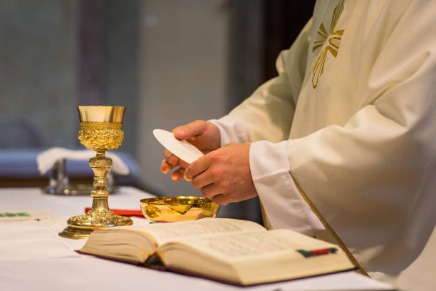 istock Priest during a wedding ceremony/nuptial mass 1073937260