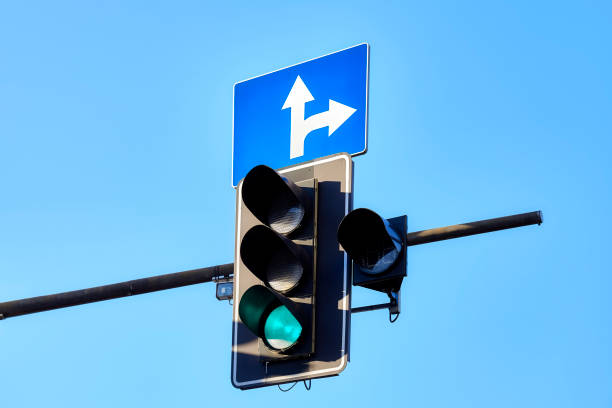 istock Traffic light against the blue sky. 1073938194