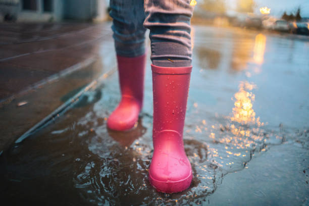 istock Close up on pink rainy boots 1073952832