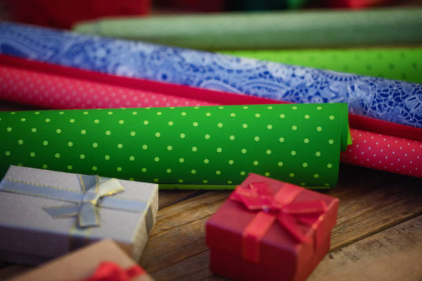 Christmas presents packed in small decorative boxes. Close up, no people