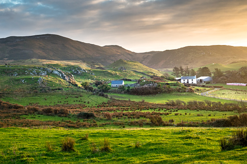 This is a picture of a farm house in a remote valley near the sea in northern Donegal Ireland