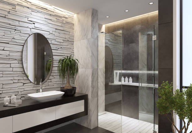 istock Luxurious minimalist bathroom with slate white stone wall 1073977966
