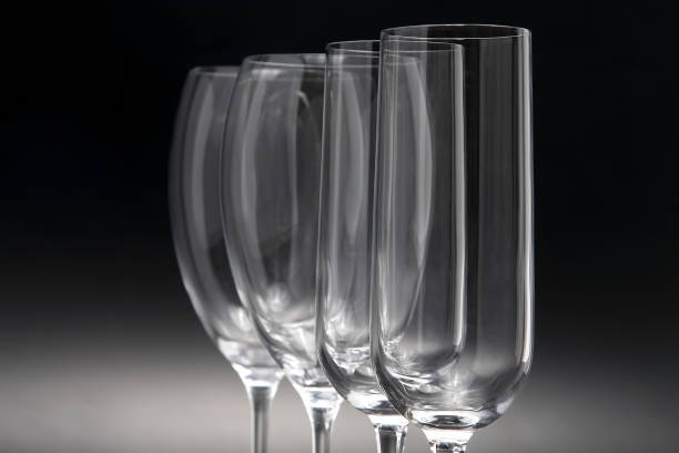 istock Four wine glasses on a dark background close-up 1073992984